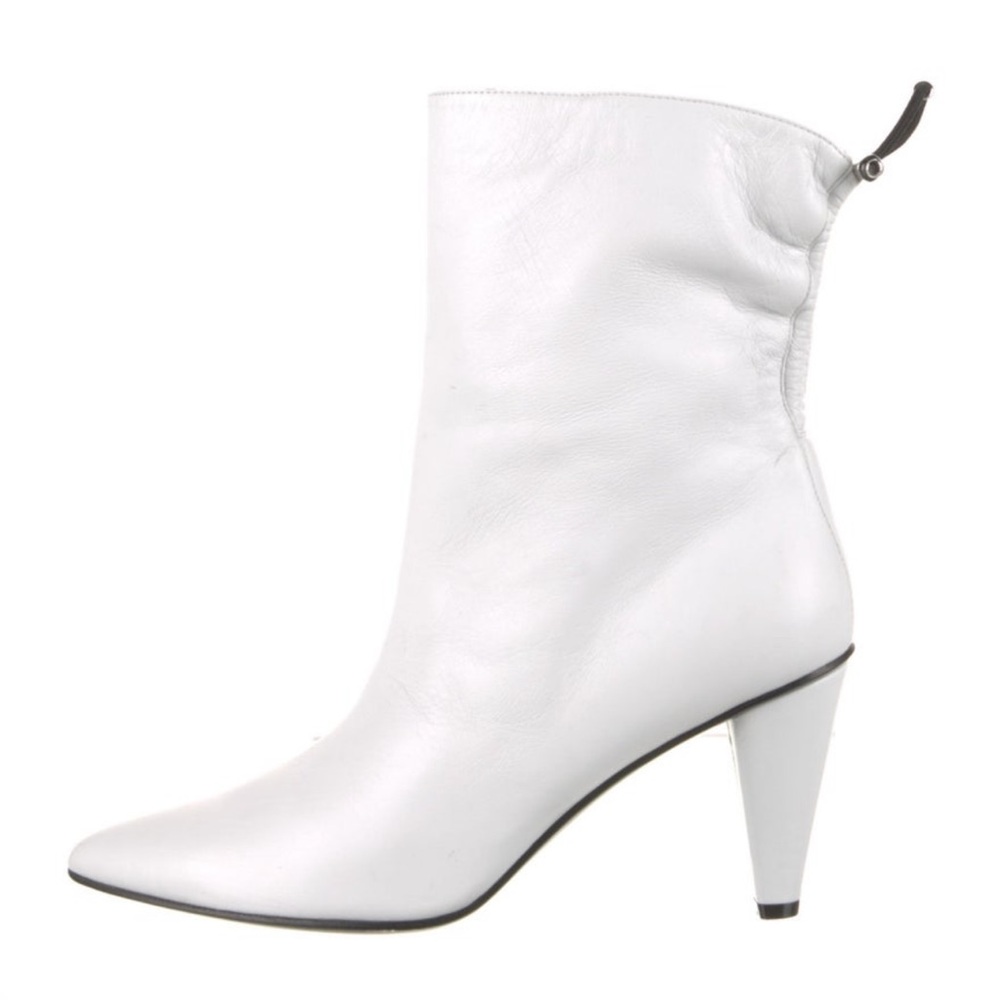 Longchamp Rare Leather White Booties original price $740.00.